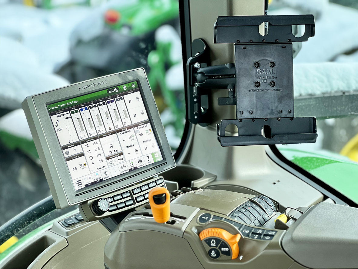 Tablet Holder on the rear corner post in a John Deere Cab