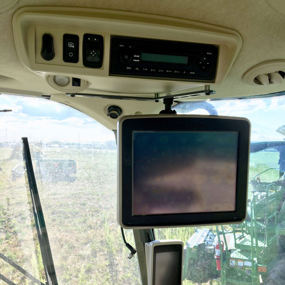 Under Radio Monitor Mounting Bracket Kit in John Deere S-Series Combine and Swathers - DB625312