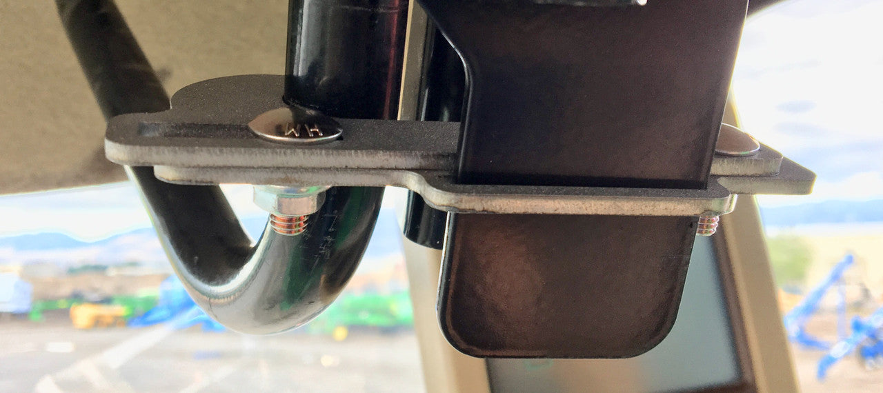 Clamp installed on the OEM bracket to keep it from flopping and shaking around.