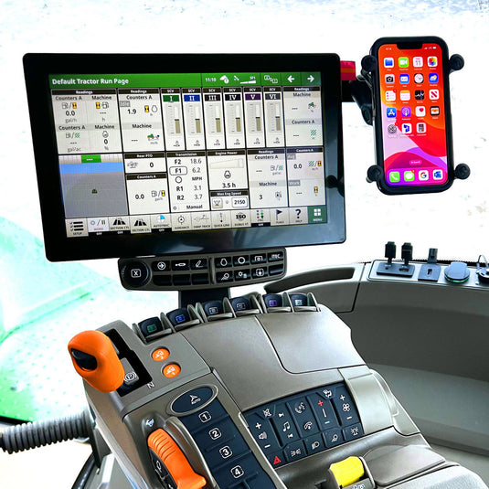 Gen5 Plus Phone Holder Mounted on the armrest of a John Deere commandarm