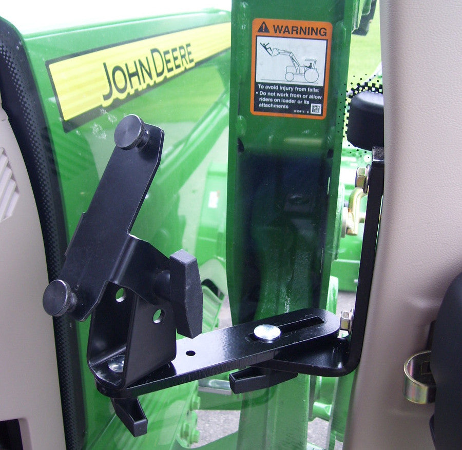 John Deere corner post cab monitor bracket with Vehicle Kit studs installed.